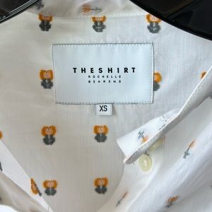 The Shirt white with floral accent blouse